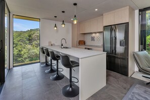 Fridge, dishwasher, toaster, cookware/dishes/utensils - The Pods - Tutukaka Coast Holiday Home (Whangarei)