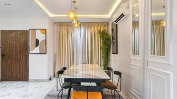 Economy Apartment, Balcony, City View | Dining room