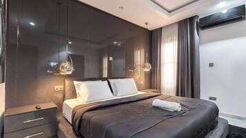 Economy Apartment, Balcony, City View | In-room safe, desk, laptop workspace, blackout curtains