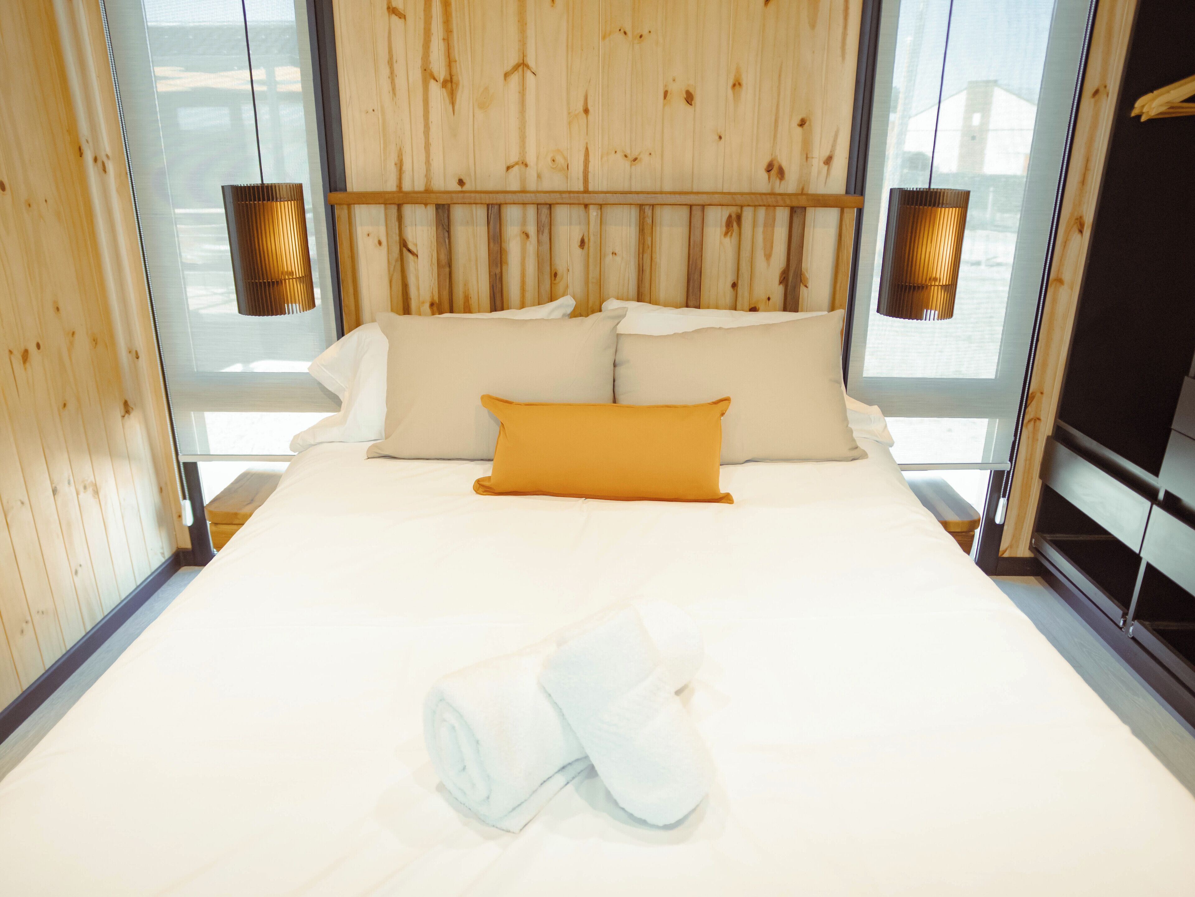 Premium bedding, down comforters, pillowtop beds, minibar