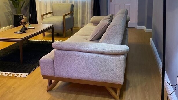 A modern living room with a sofa, a coffee table, and a lamp. - 3 Bedroom En-Suite, Wi-Fi, Secured, 24/7 Power (Lagos)
