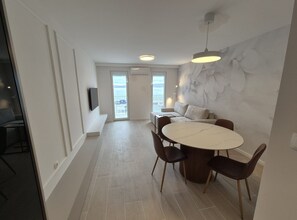 Appartamento (One bedroom apartment I) | Soggiorno | TV a schermo piatto 32 pollici con canali satellitari