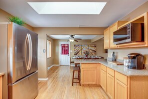 Fridge, microwave, stovetop, dishwasher - Gather Family! Home w/ Fenced Yard in Wheat Ridge (Wheat Ridge)