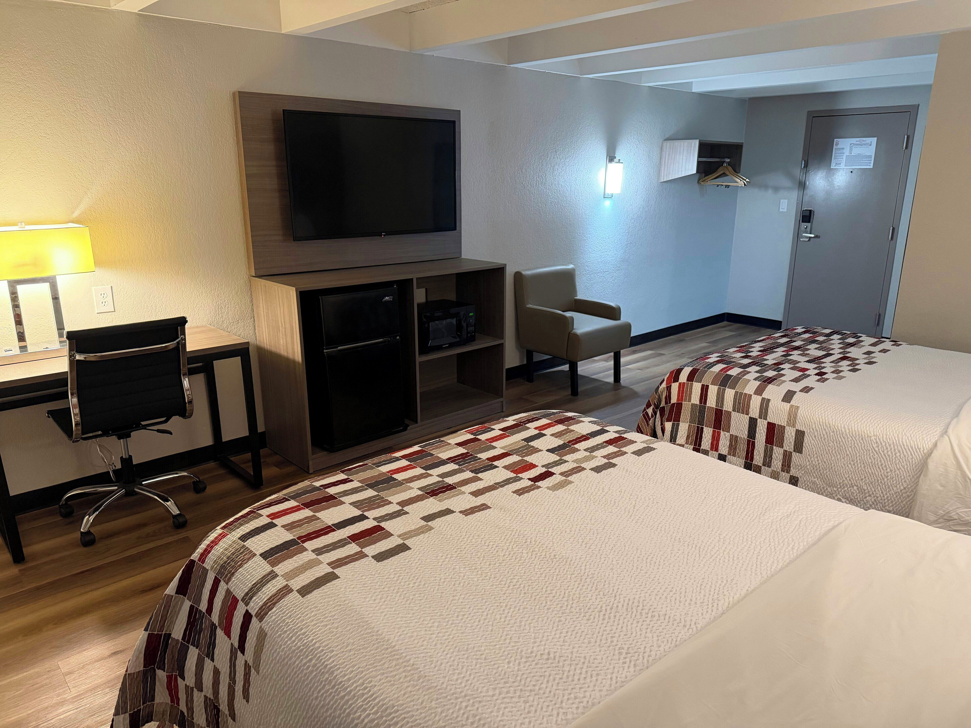 Desk, laptop workspace, free WiFi, bed sheets