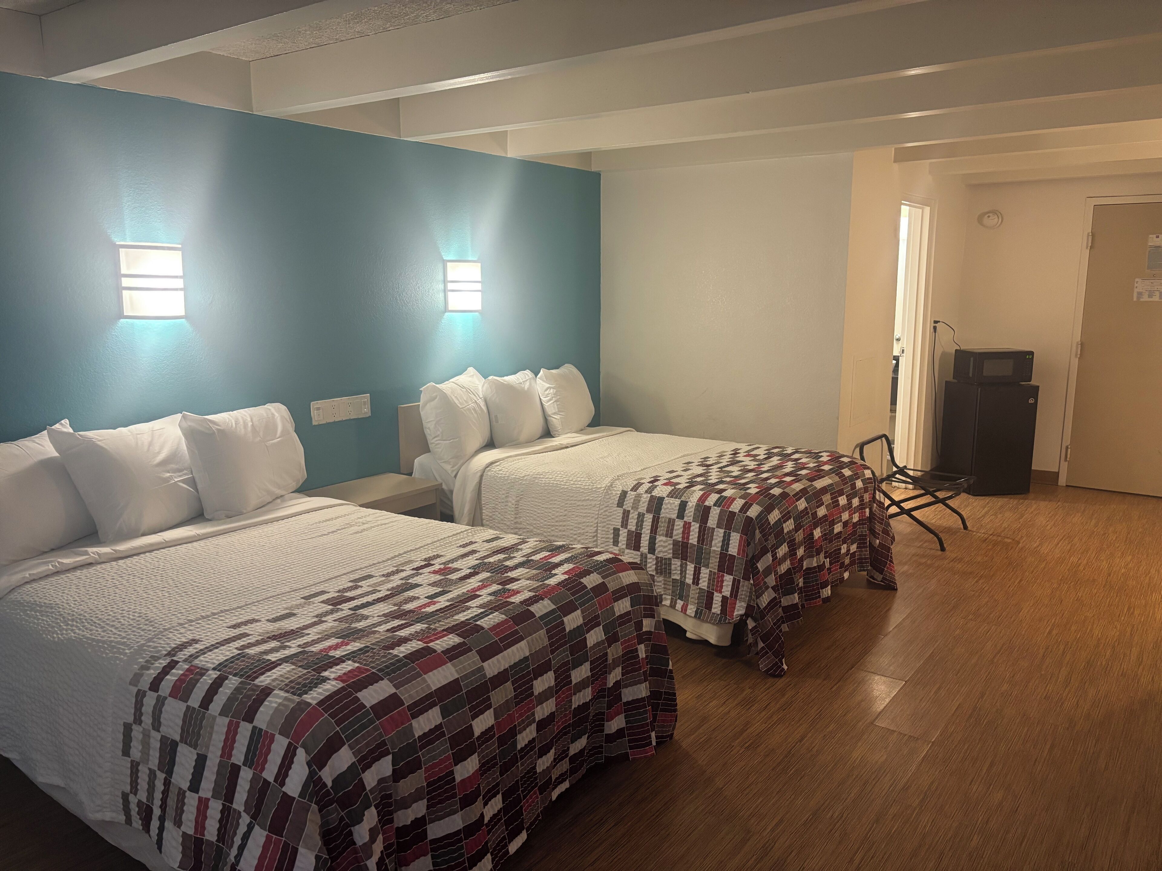 Desk, laptop workspace, free WiFi, bed sheets