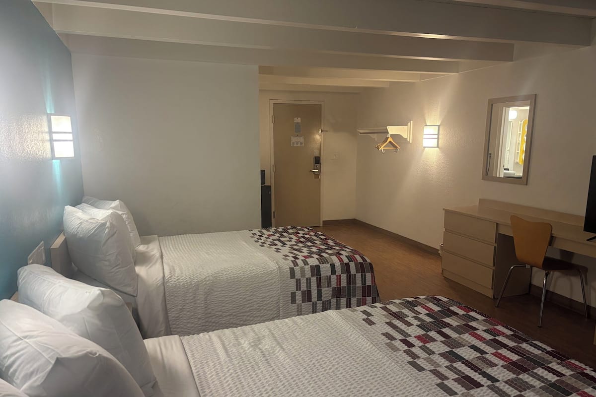 Desk, laptop workspace, free WiFi, bed sheets