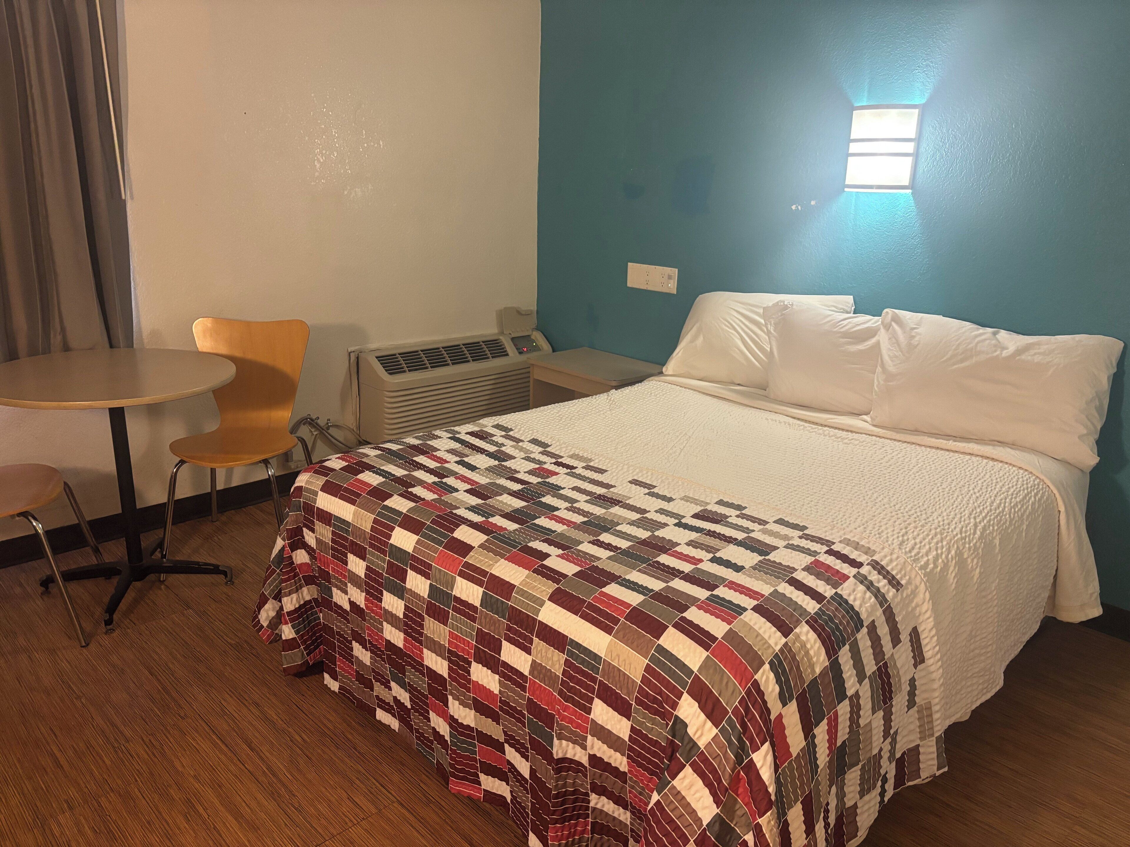 Deluxe Room, 1 Queen Bed, Non Smoking (Roll-in Shower) | Desk, laptop workspace, free WiFi, bed sheets