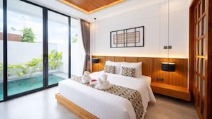A modern hotel room with a large bed, a wooden ceiling, a view of a swimming pool, and a wall-mounted artwork. - Omkara Dharman Ubud Villa (Bali)