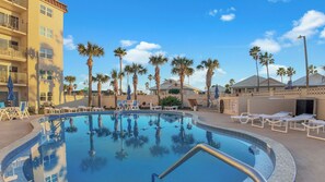Outdoor pool - Beachside 1st Floor Condo with Patio,Heated Pool & Gas BBQ – 3 Min Walk to Beach (Daytona Beach Shores)
