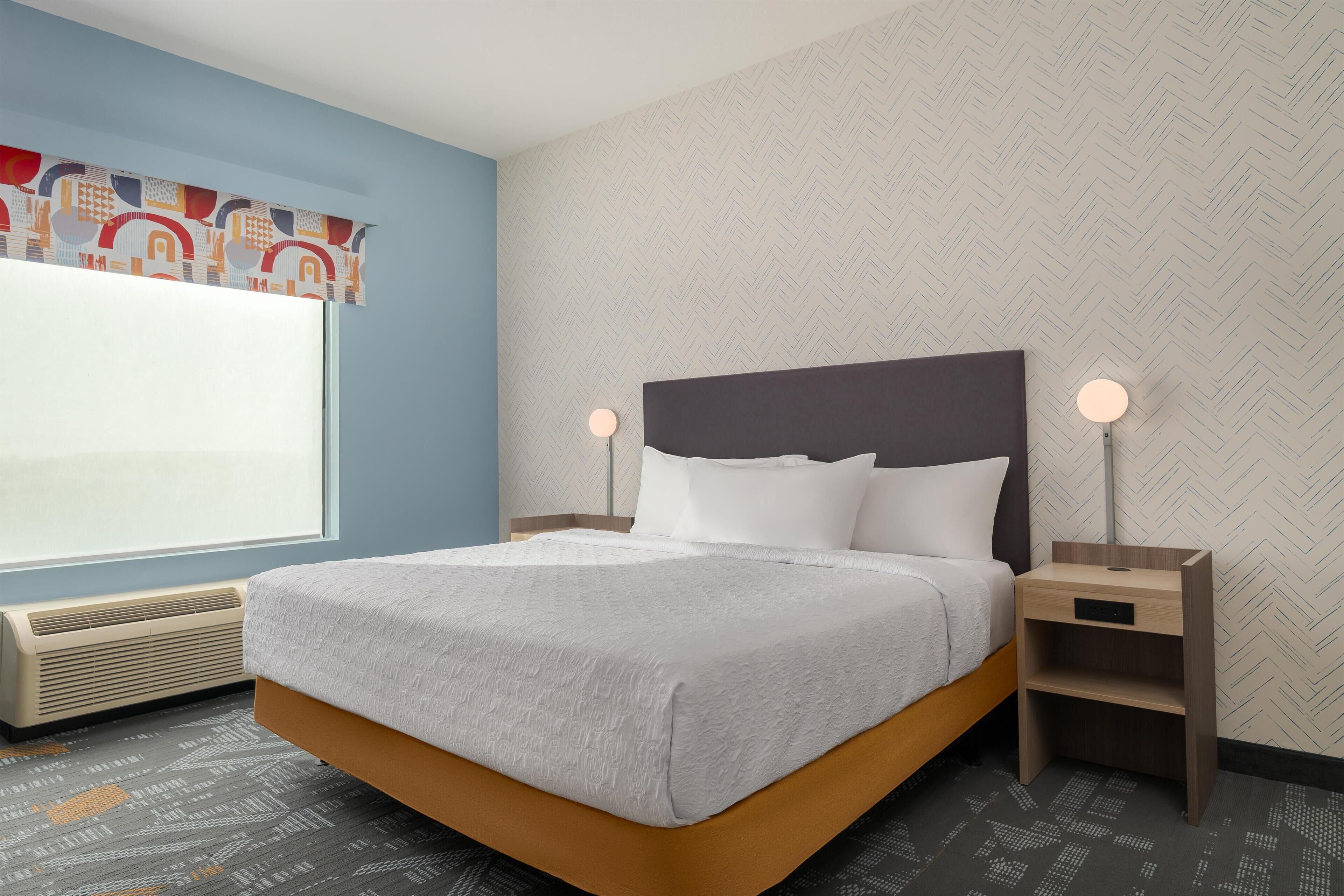 Premium bedding, desk, blackout curtains, iron/ironing board