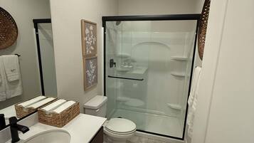 Hair dryer, towels, soap, toilet paper