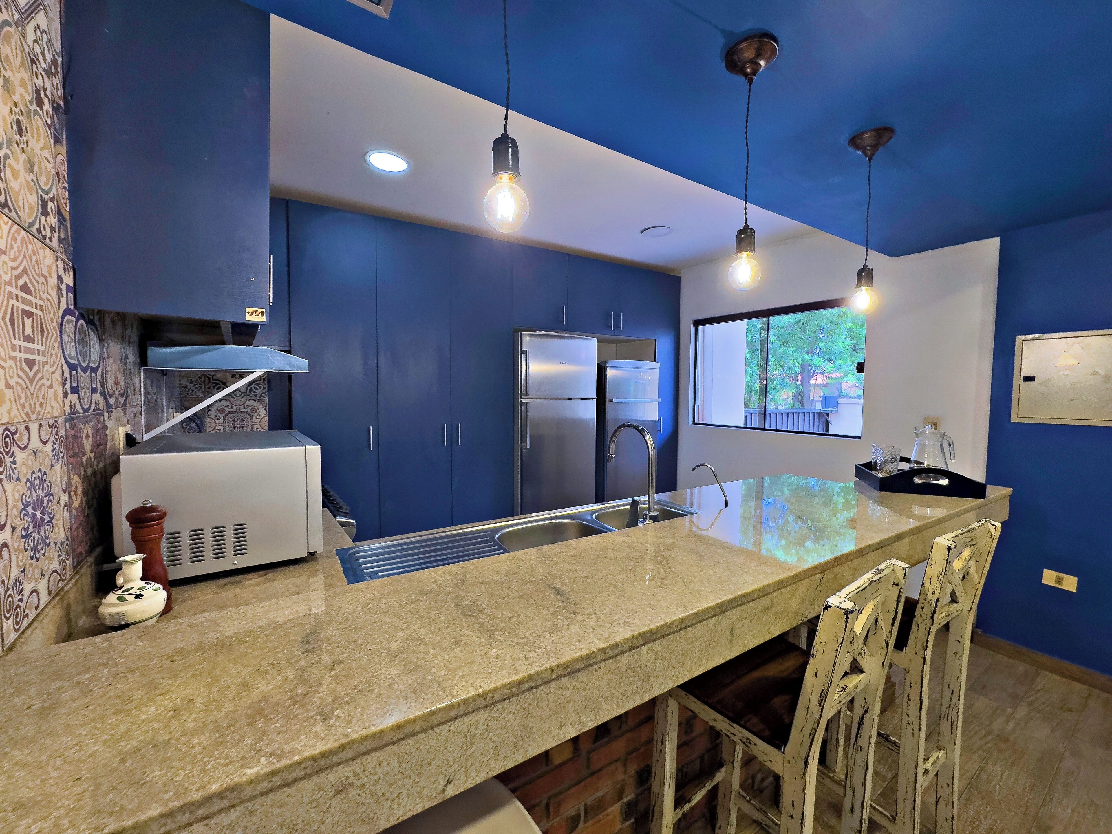 Casa Confort, balcón, vista al patio | Cocina privada