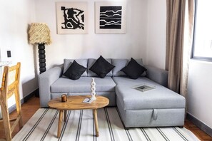 Habitación individual básica | Área de sala de estar