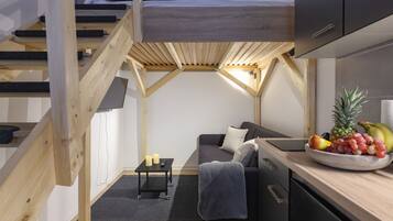 Tabla de planchar con plancha, wifi gratis y ropa de cama