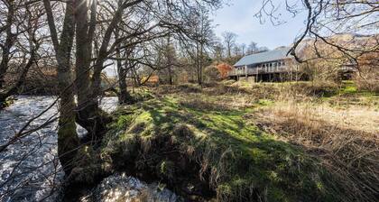 Cosy Riverside Escape with Hot Tub | Garth Cottage