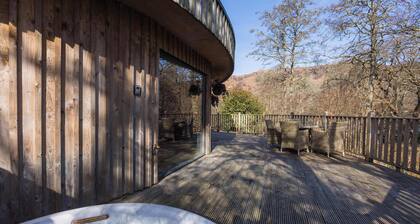 The Crannog | Circular Riverside Retreat with Hot Tub