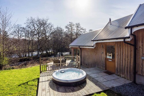 Beautiful river fronted house with private hot tub