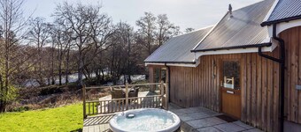Beautiful river fronted house with private hot tub