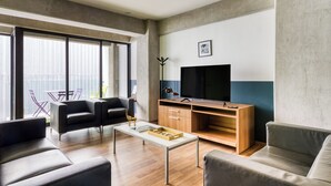 Chambre Confort | Coin séjour