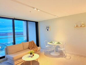 Living area - Lake view 1bed with car parking walk to westfield (Belconnen)
