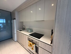 Private kitchen - Lake view 1bed with car parking walk to westfield (Belconnen)