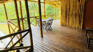 Premium Cottage, Pool Access, Pool View | Outdoor dining