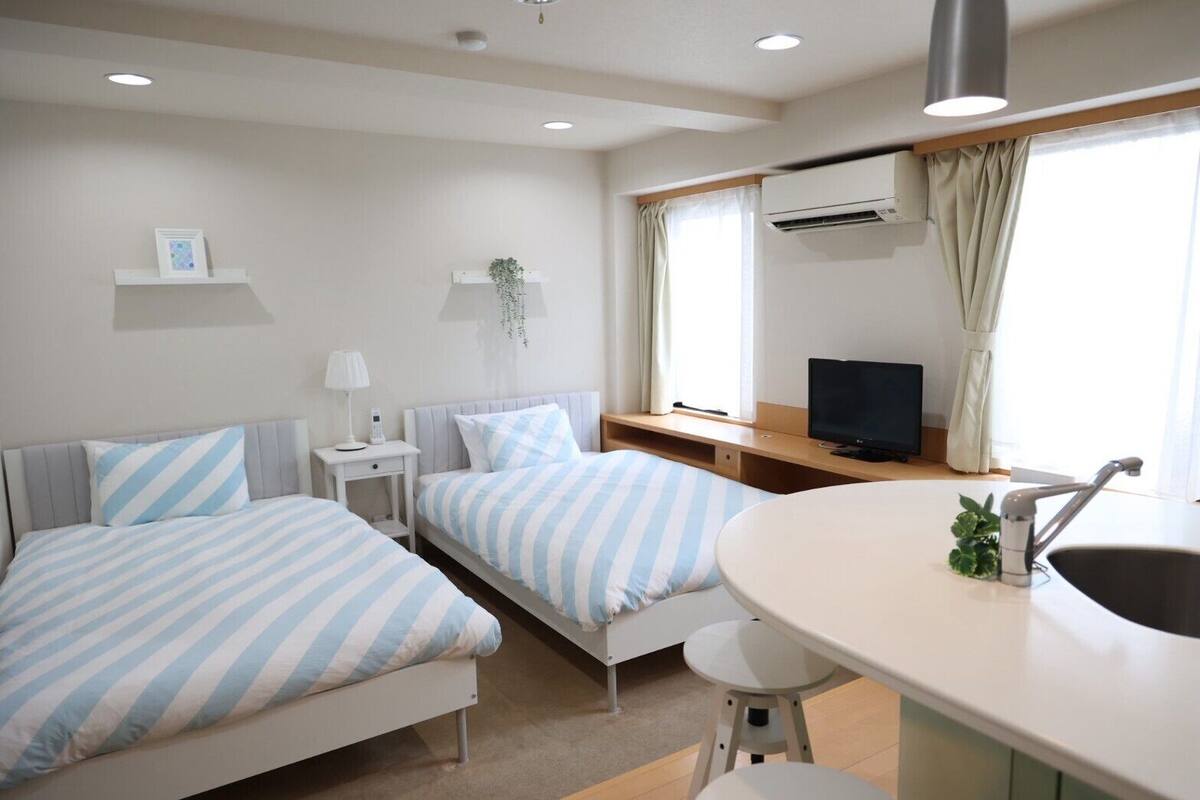 Family Studio, City View | Blackout drapes, soundproofing, iron/ironing board, free WiFi