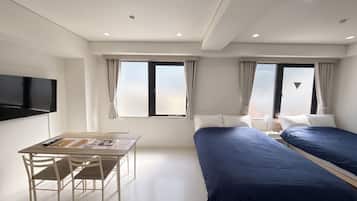 Quarto duplo conforto, vista para a cidade | Cortinas blackout, quartos à prova de som, ferros/tábuas de passar roupa