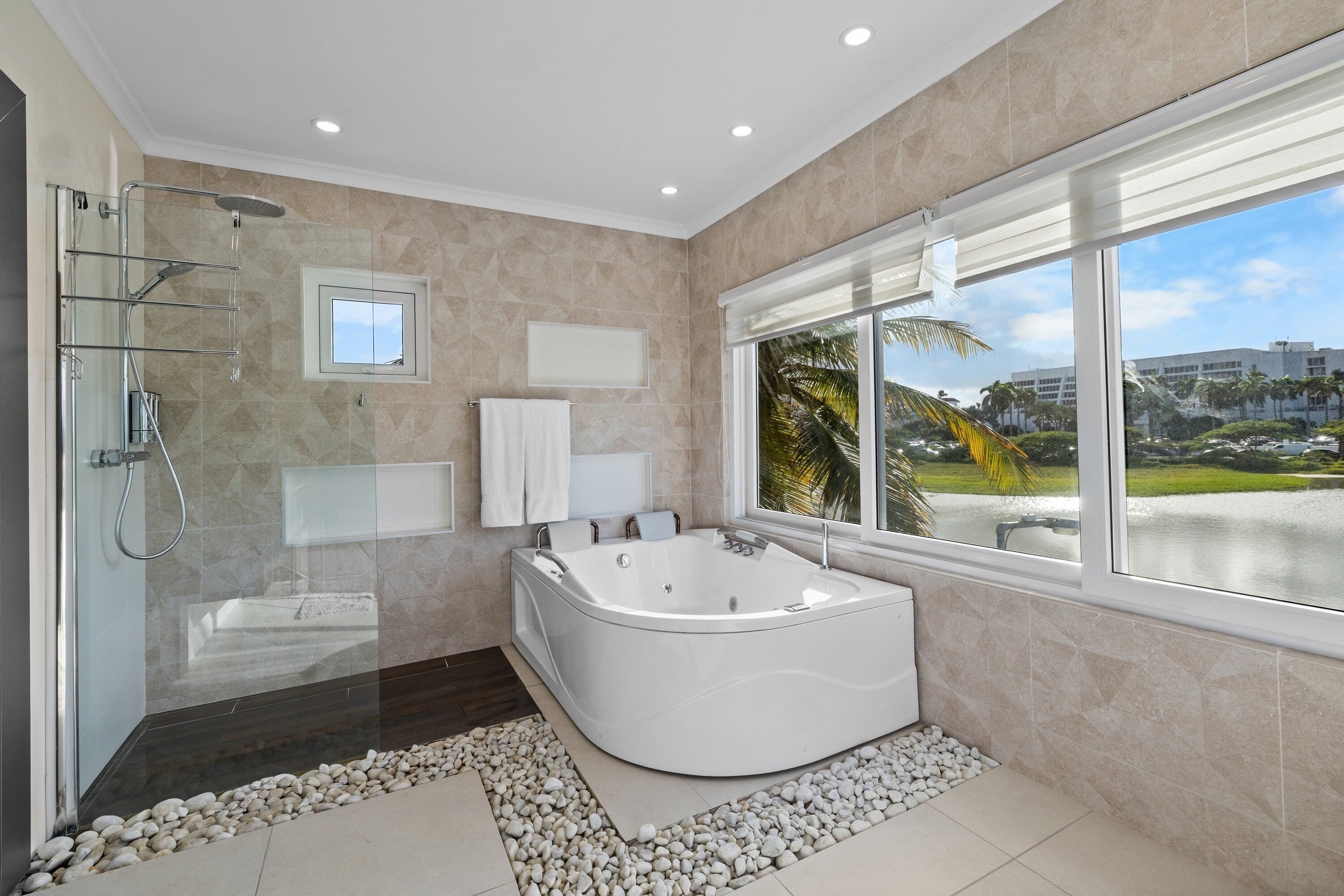 Shower, jetted bath, hair dryer, towels