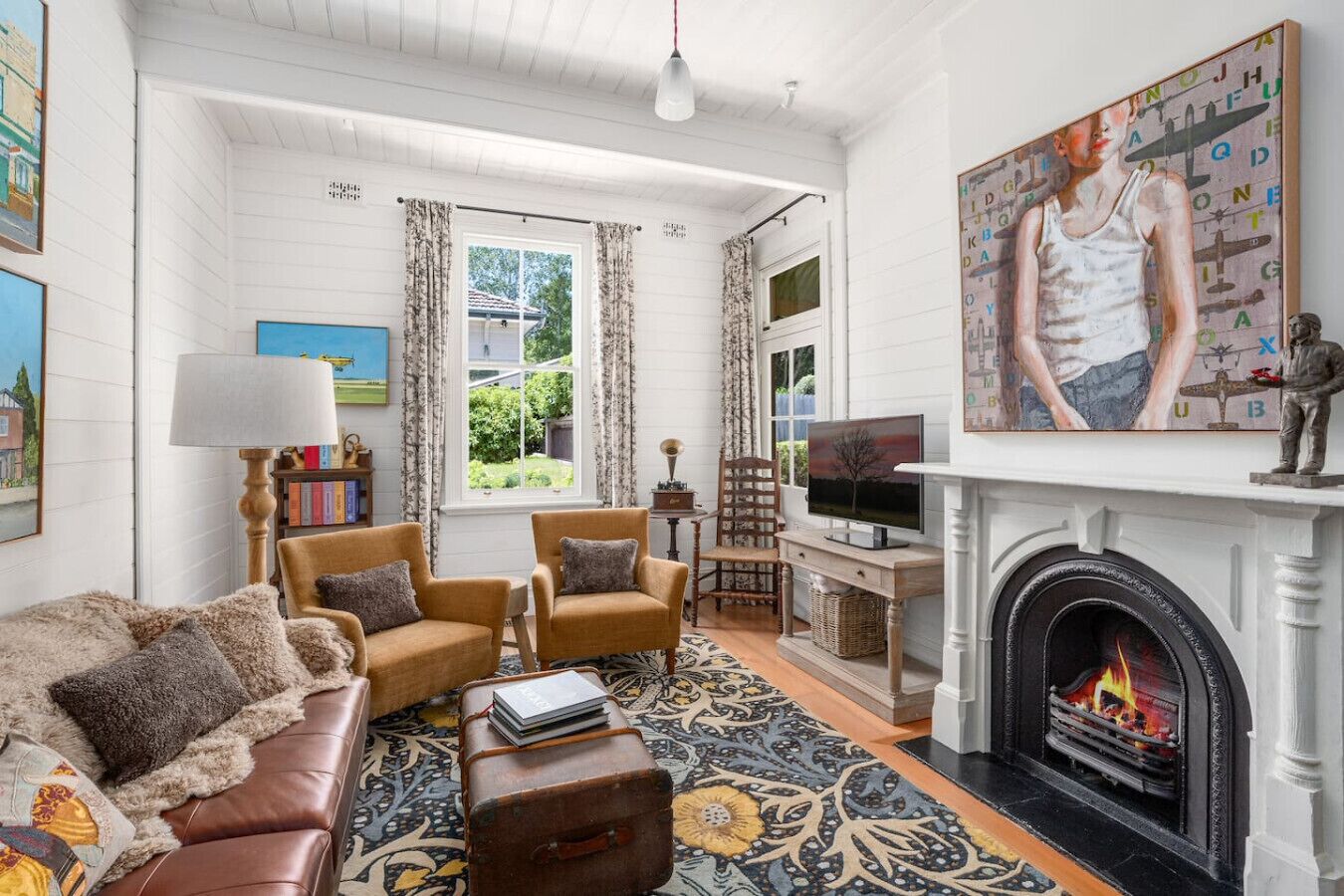 TV, fireplace, books, stereo