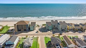 On the beach, sun-loungers, beach towels