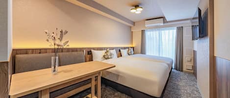Kamar Quadruple Standar, 2 Tempat Tidur Double, Bebas Asap Rokok | Meja kerja, tirai kedap cahaya, Wi-Fi gratis, dan seprai linen