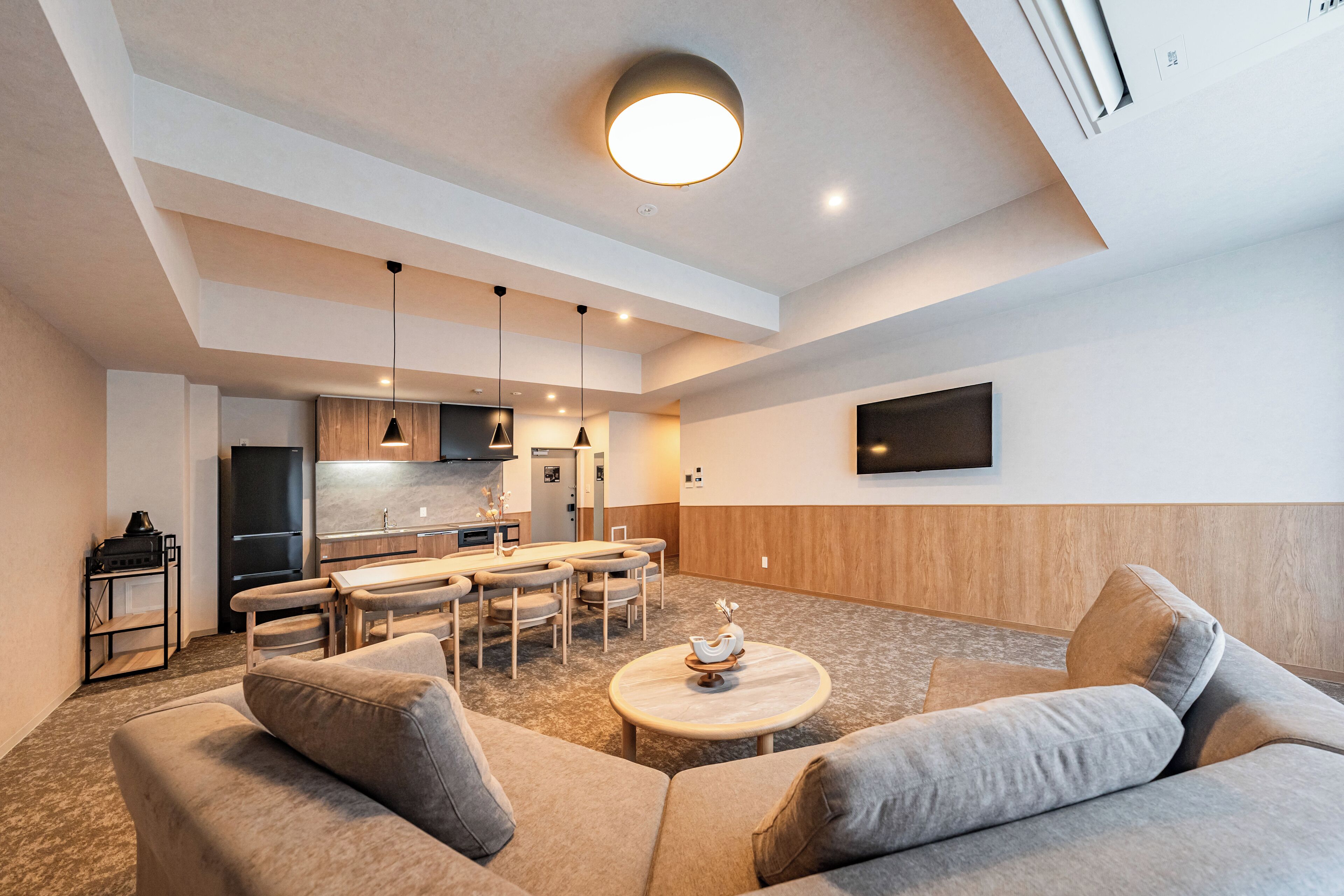 Deluxe Suite, Balcony, City View | Living area | 40-inch flat-screen TV with digital channels