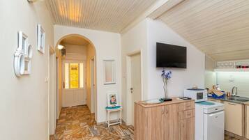 Fridge, microwave, cookware/dishes/utensils