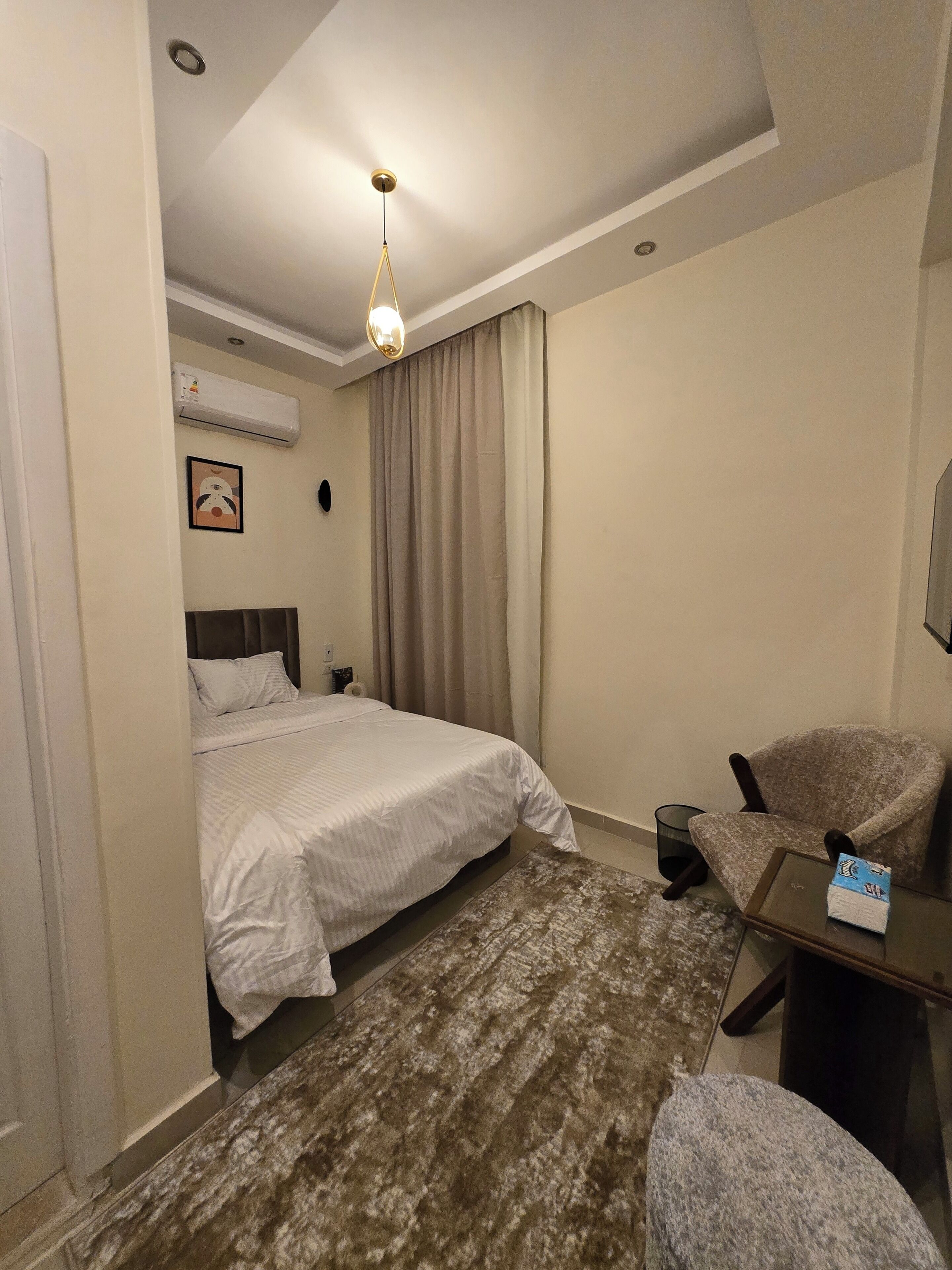 Junior Single Room, Balcony, Garden View | In-room safe, blackout drapes, soundproofing, iron/ironing board