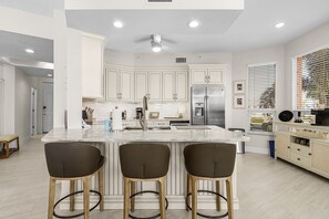Fridge, microwave, oven, stovetop - Palm Harbor #201 on Fort Myers Beach with canal views and pool access (Fort Myers Beach)