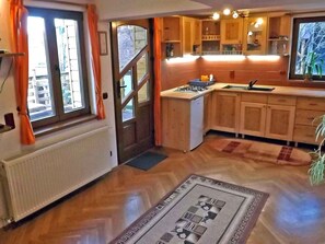 Fridge, microwave, cookware/dishes/utensils