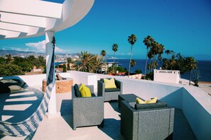 Terrace/patio - Surf & Wine Retreat: Oceanview Home with Climbing Wall at Playa San Miguel (Balcones Cíbolas del Mar)