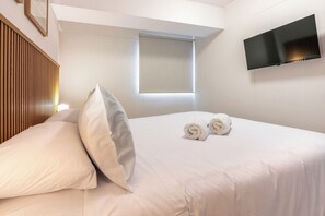 1 habitación, tabla de planchar con plancha, cuna de viaje y wifi 