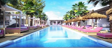Outdoor pool, free pool cabanas, pool umbrellas
