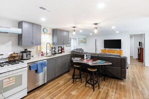 Fridge, microwave, toaster, cookware/dishes/utensils