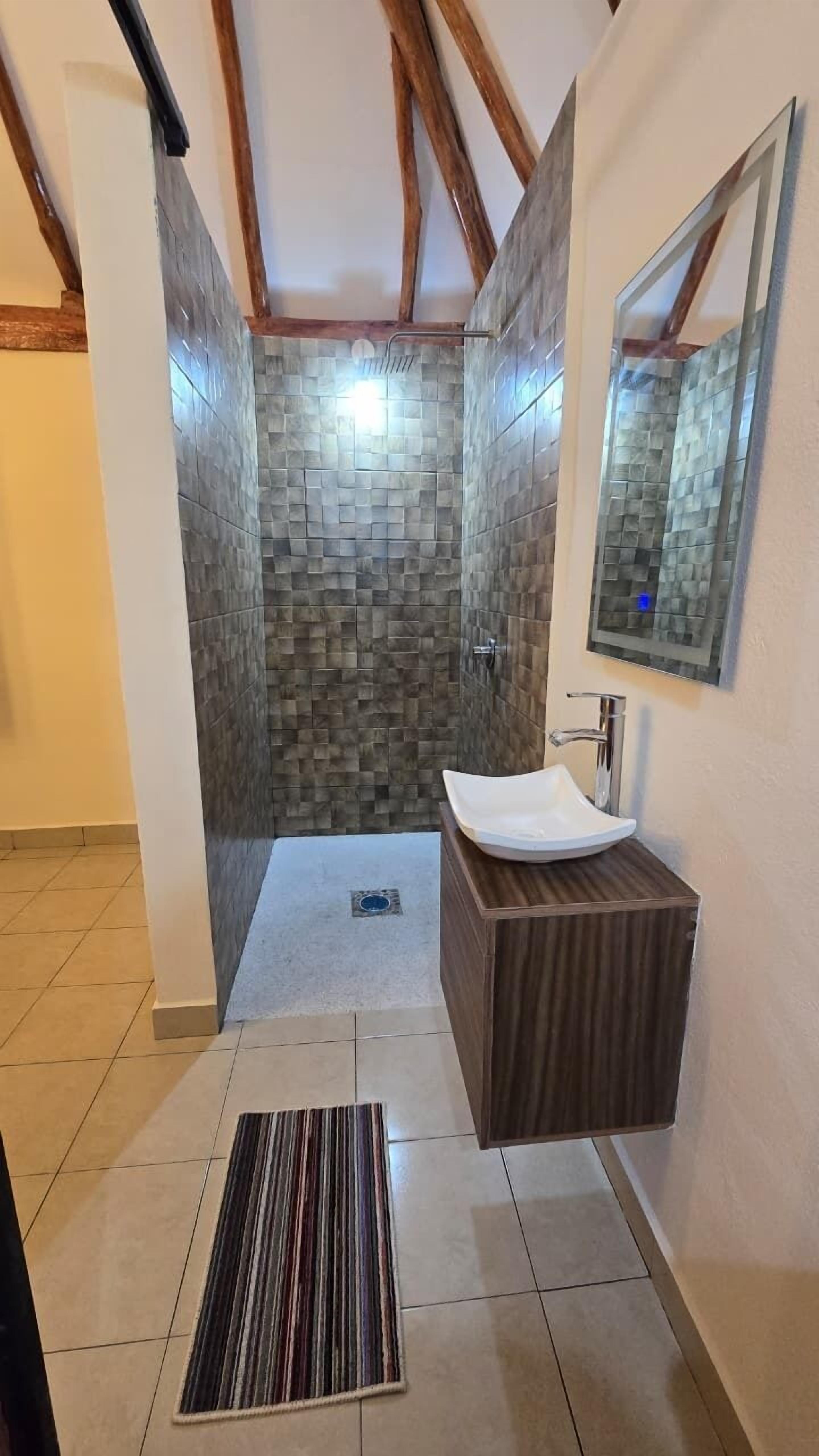 Shower, towels, soap, shampoo