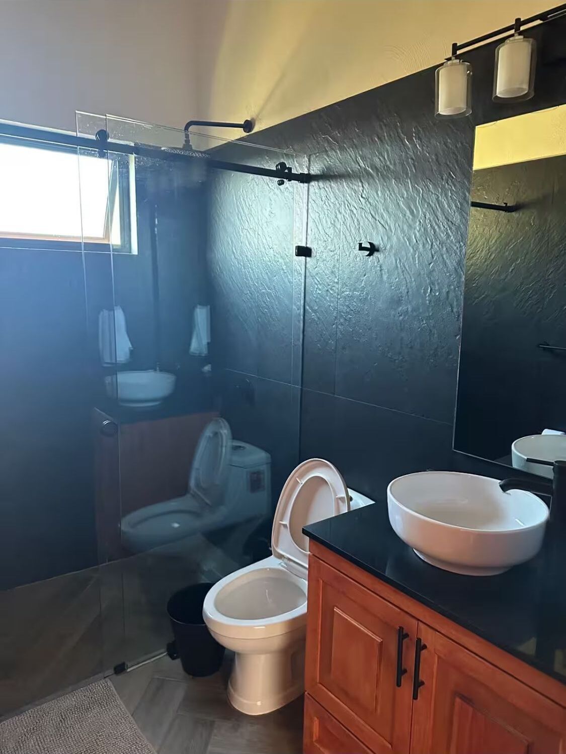 Shower, towels, soap, toilet paper