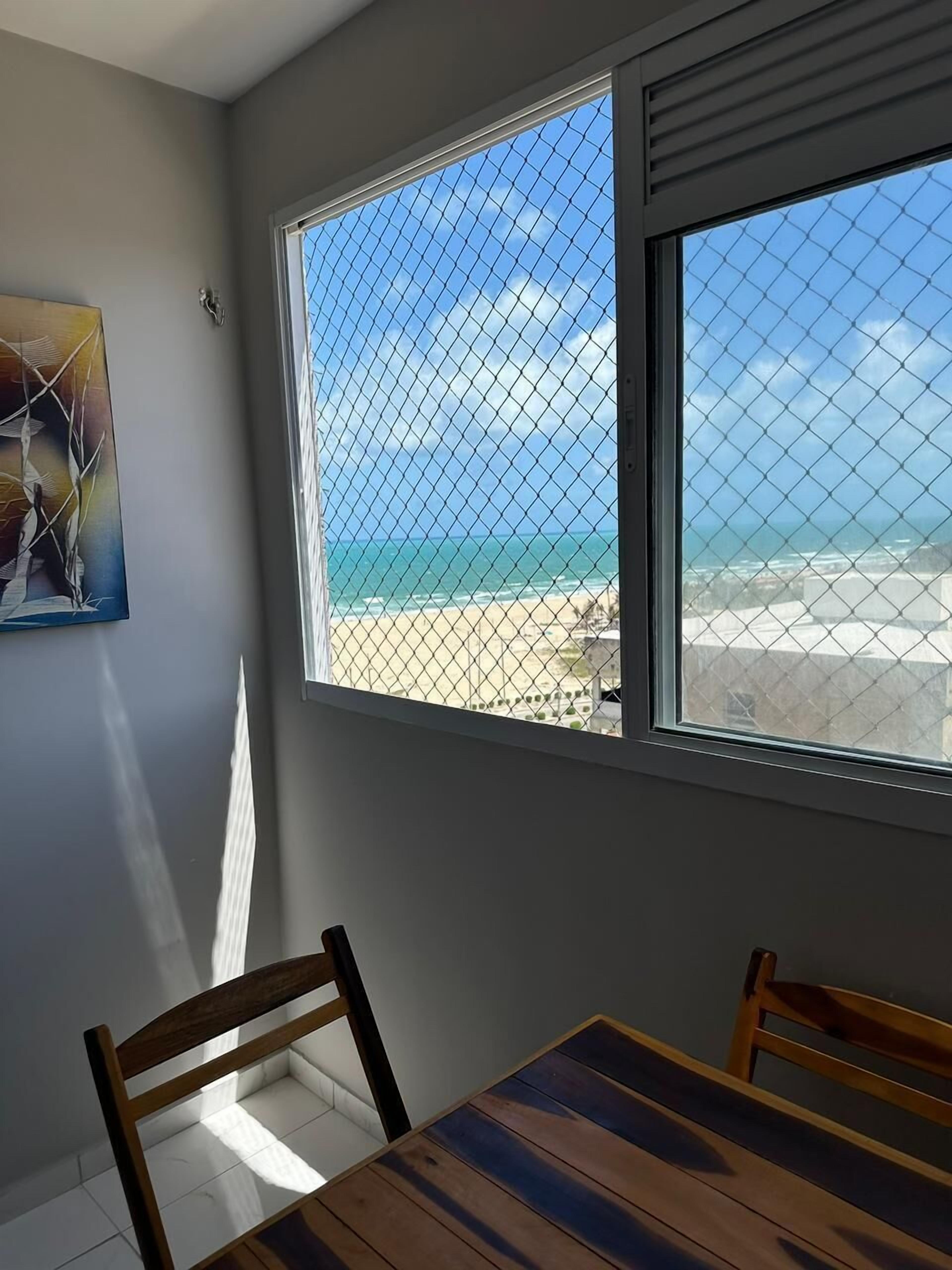 Family Apartment, Patio, Sea View | In-room dining