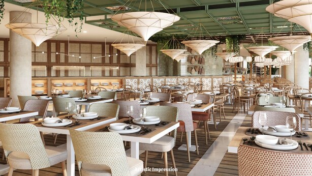 Un restaurante espacioso con techos altos, plantas colgantes y diferentes opciones de mesas.