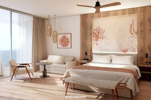 A modern hotel room with a large bed, a sitting area with a sofa and chairs, a dining table, and a large window with curtains. - Elba Corralejo Premium Level (La Oliva)