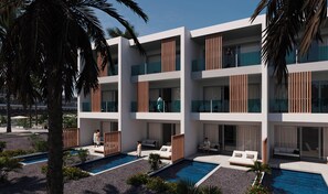 Un hôtel moderne doté de nombreux balcons, d’une piscine et d’espaces de détente en plein air.