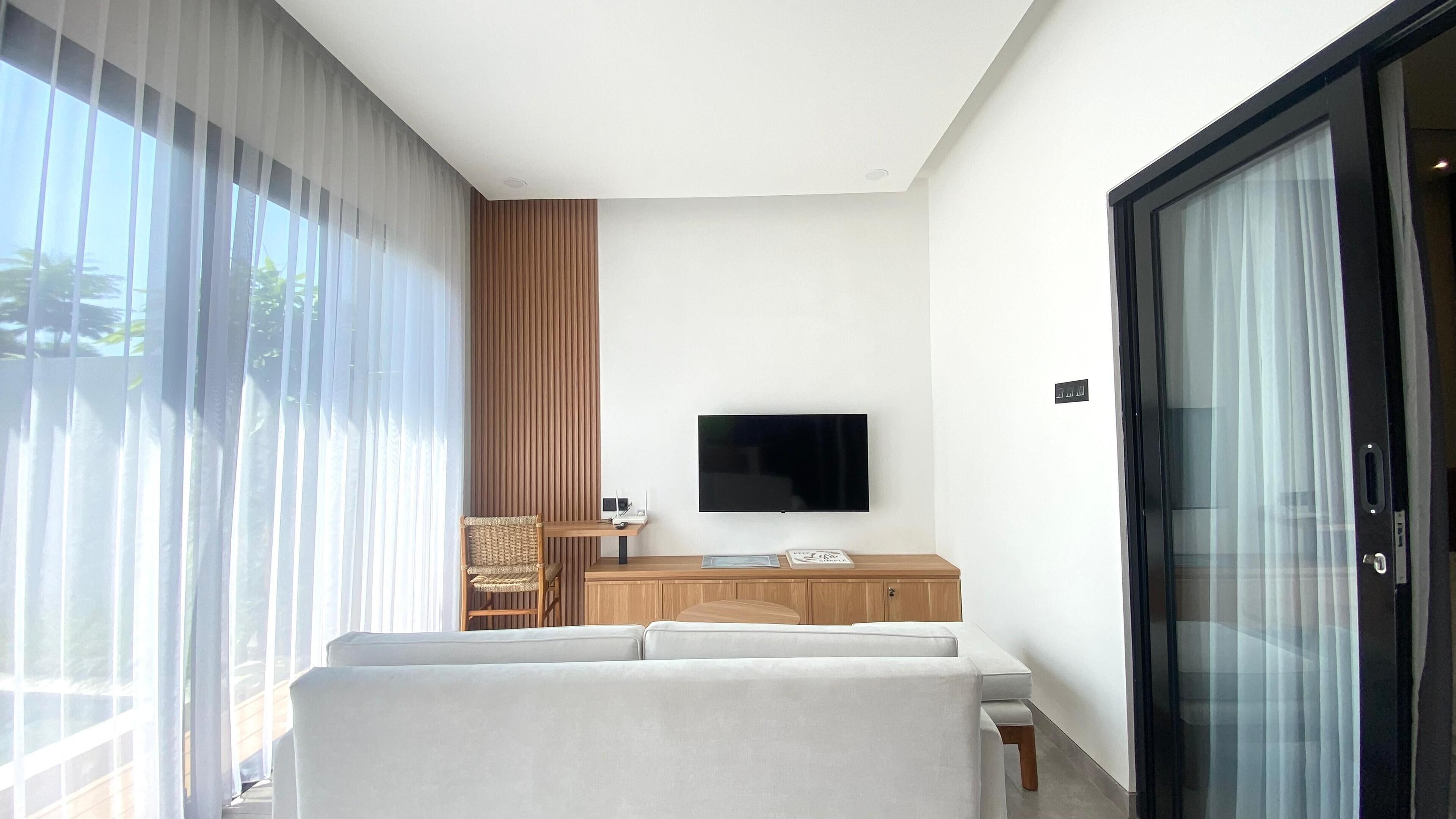 Comfort Villa, Private Pool | Living area | 24-inch flat-screen TV with cable channels