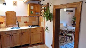 Fridge, microwave, cookware/dishes/utensils