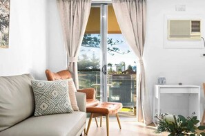 TV, offices - Coastal Bliss: 2BR Apartment in Glenelg (Glenelg South)